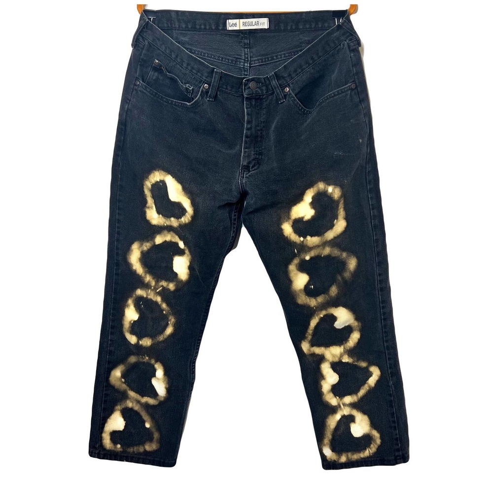 Black denim jeans with contrast hearts